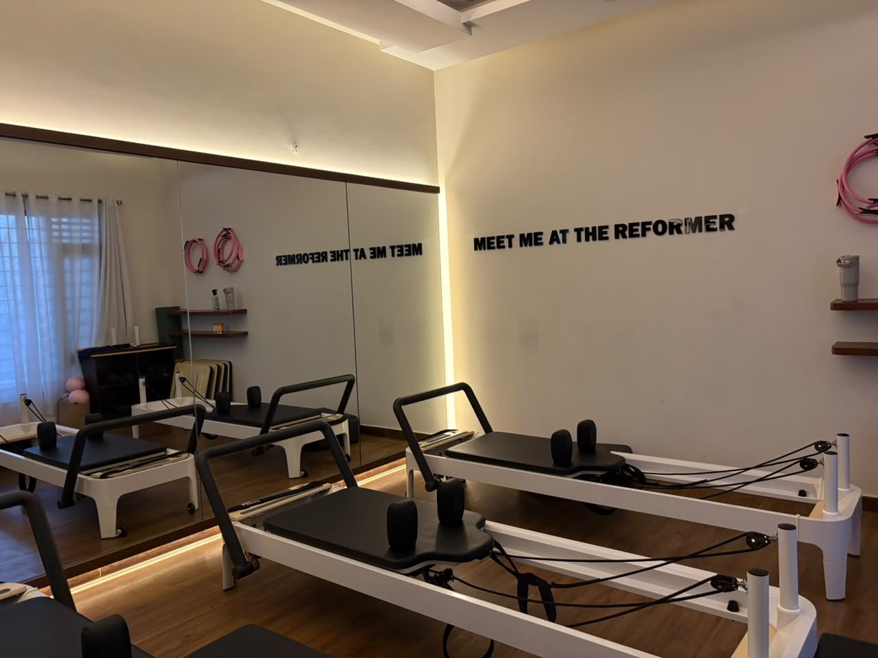Reformer machines and mirrors at the Reform by RJ studio